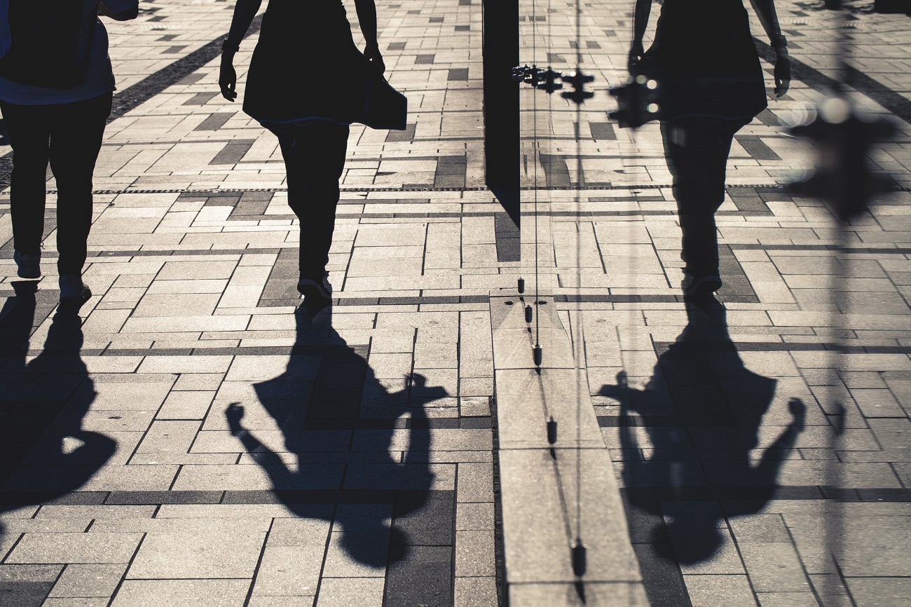 Shadows of people walking.