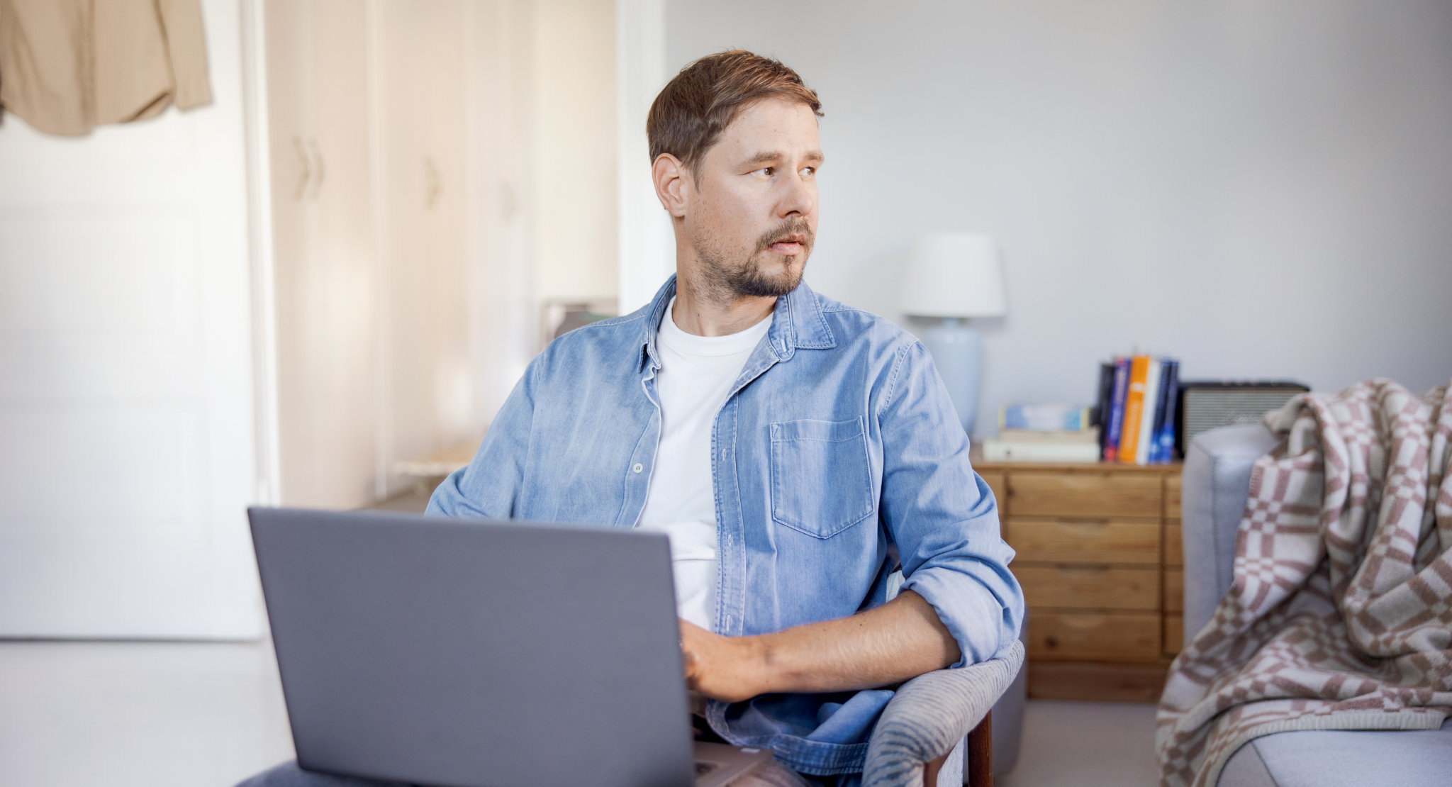 A man on a computer.